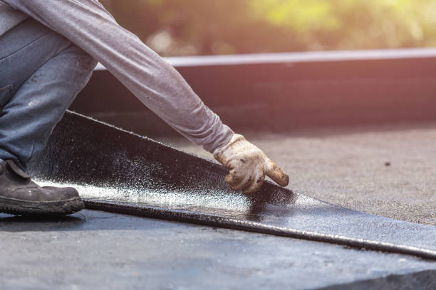 Professional Basement Waterproofing technician working in Walkerton, IN
